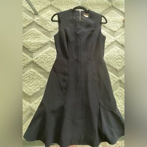 Two never worn Louis Vuitton Uniformes shell dresses with scalloped bottom.